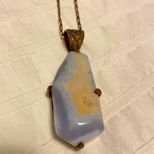 Sundance Necklace, rare cut and color stone with bronze chain.